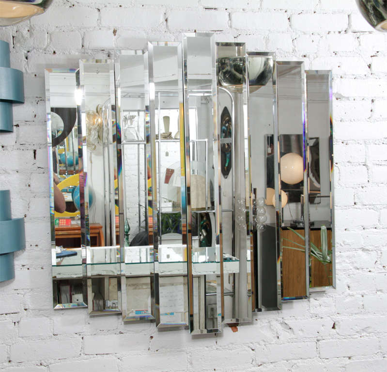 All that glitters is not gold! Deco inspired stacked/beveled wall mirror.  Located at Las Venus 163 Ludlow Street 212-982-0608.